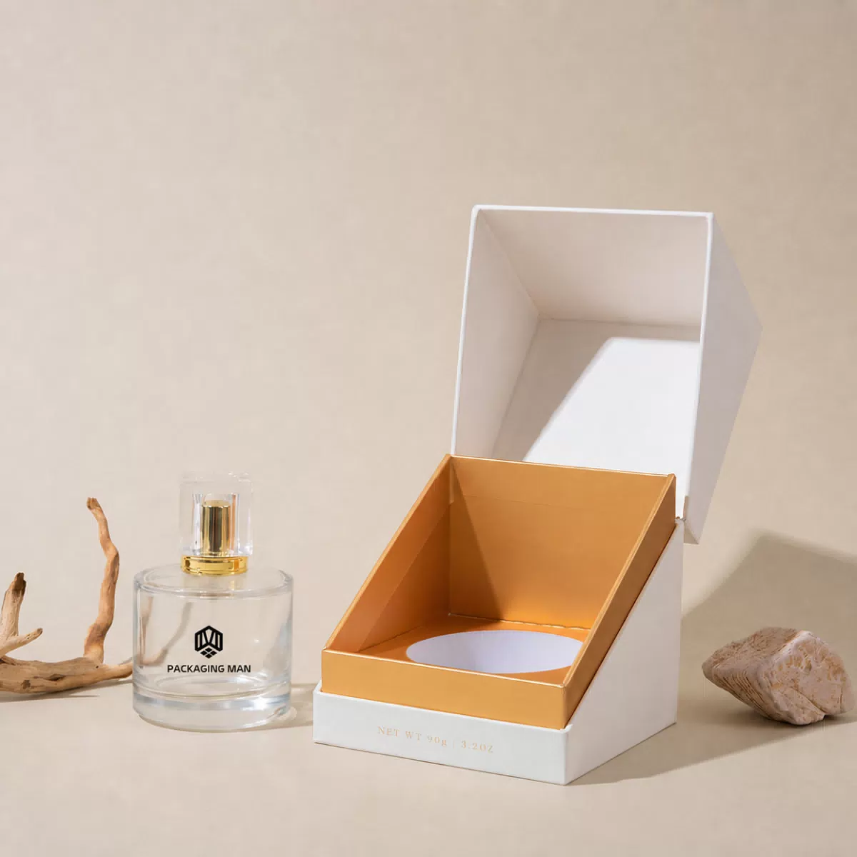 Open white rigid box with gold interior