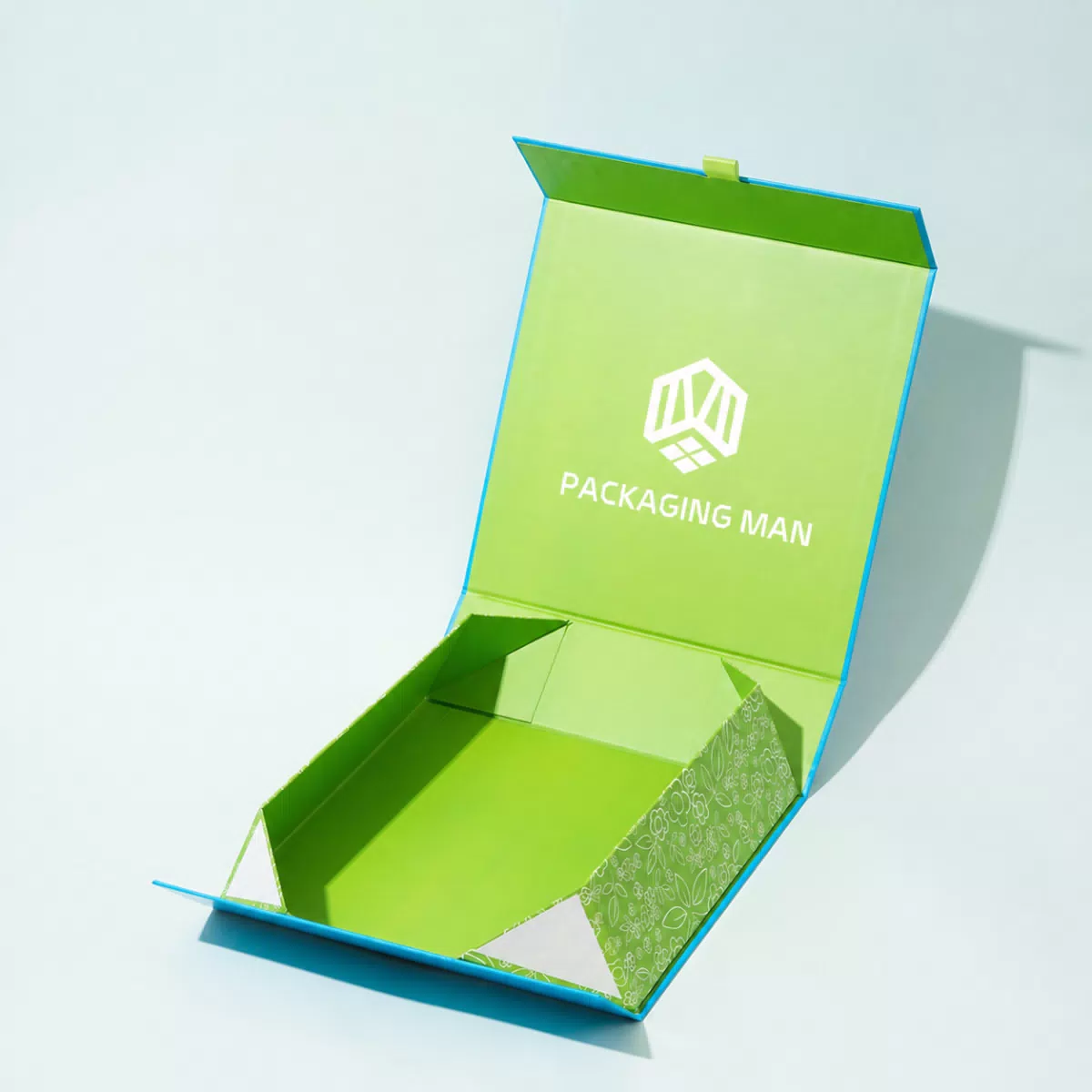 Open blue and green rigid gift box