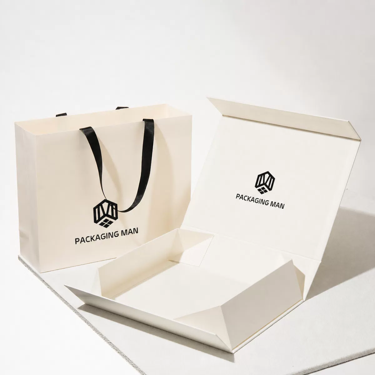 Cream gift box packaging set with black handles