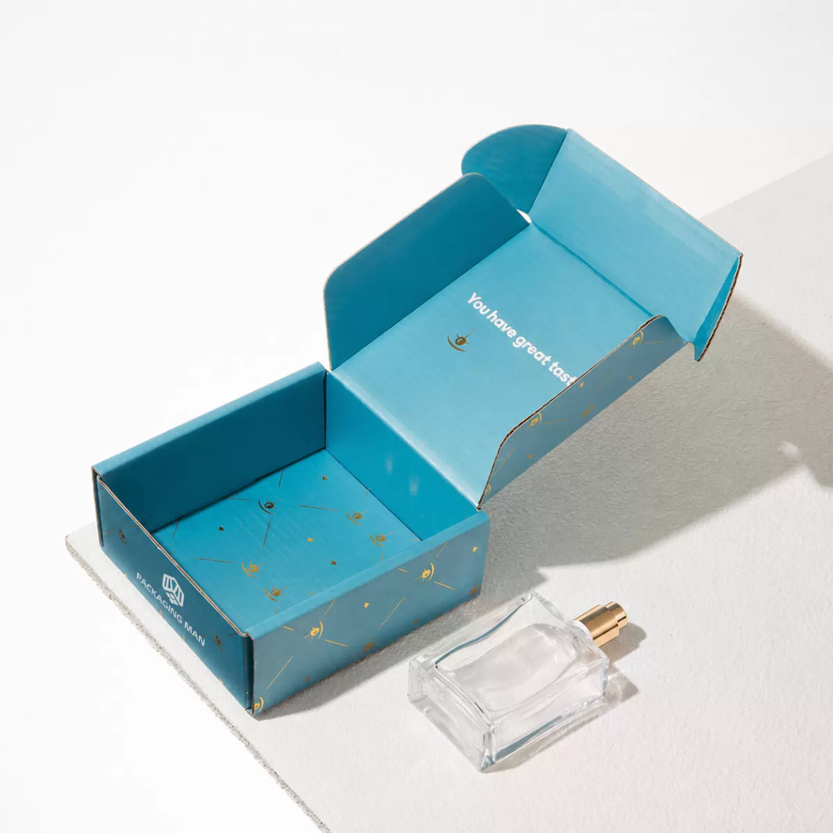 Blue custom mailer box packaging open empty