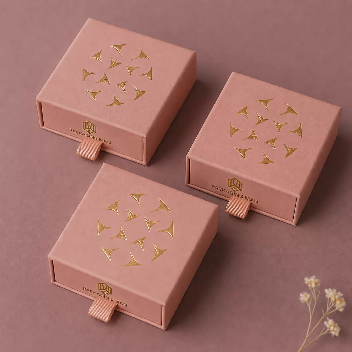 Pink rigid drawer boxes with gold detailing