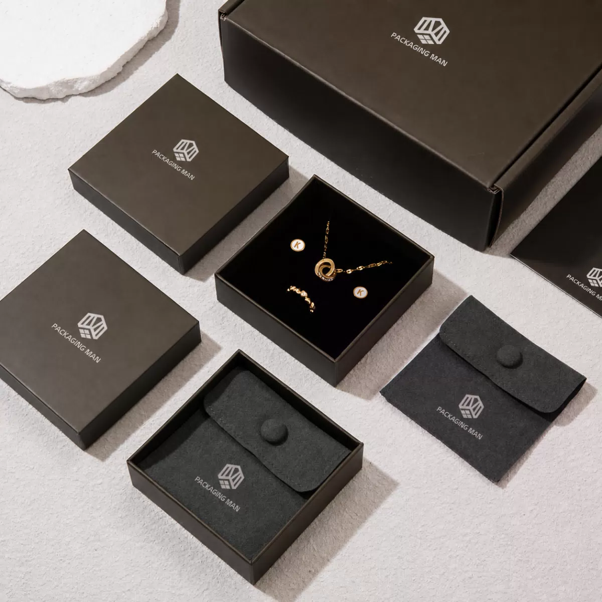 Dark rigid boxes with jewelry insert tray