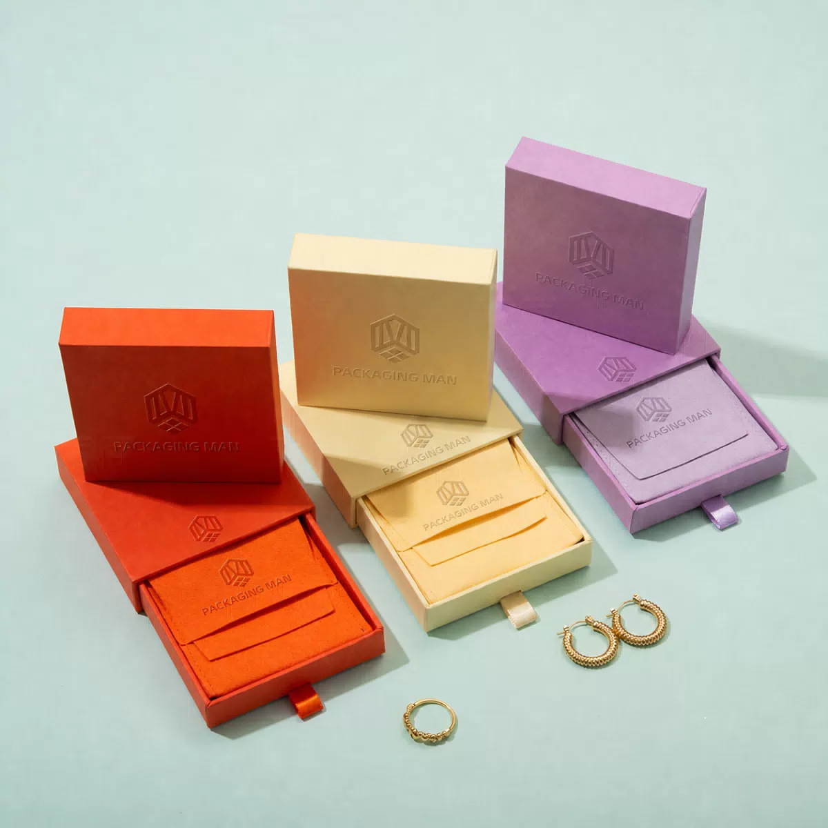 Stacked colorful rigid drawer packaging boxes