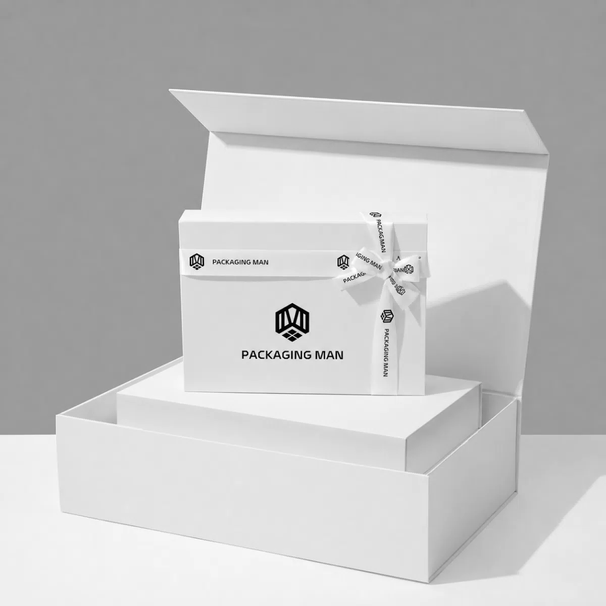 Open white gift box with ribbon