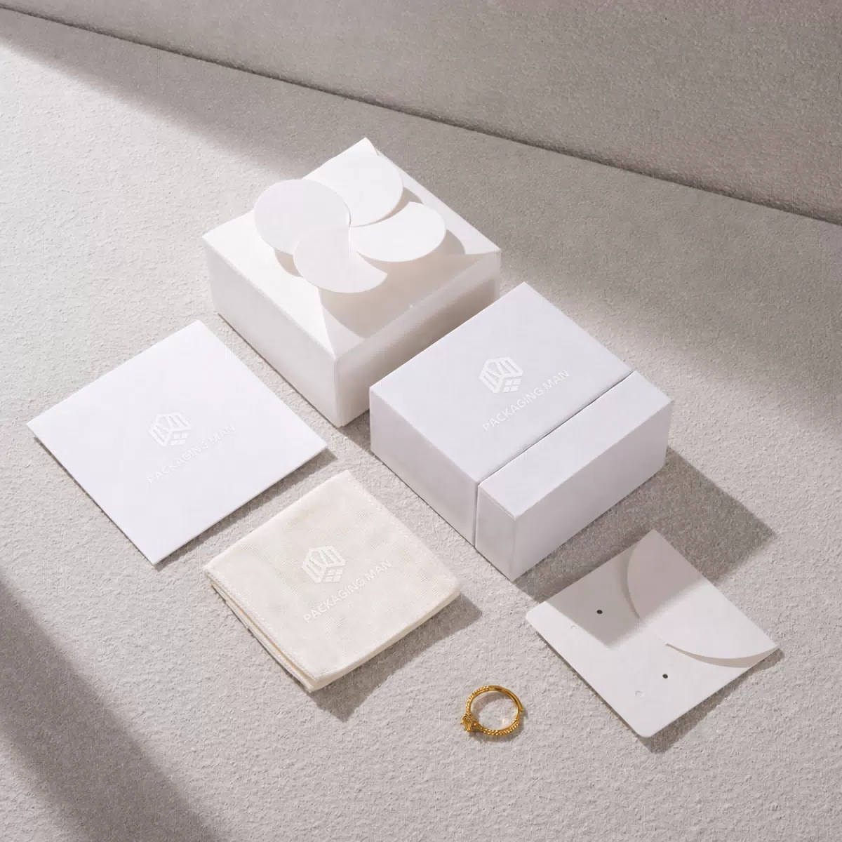 Minimalist white rigid box packaging components