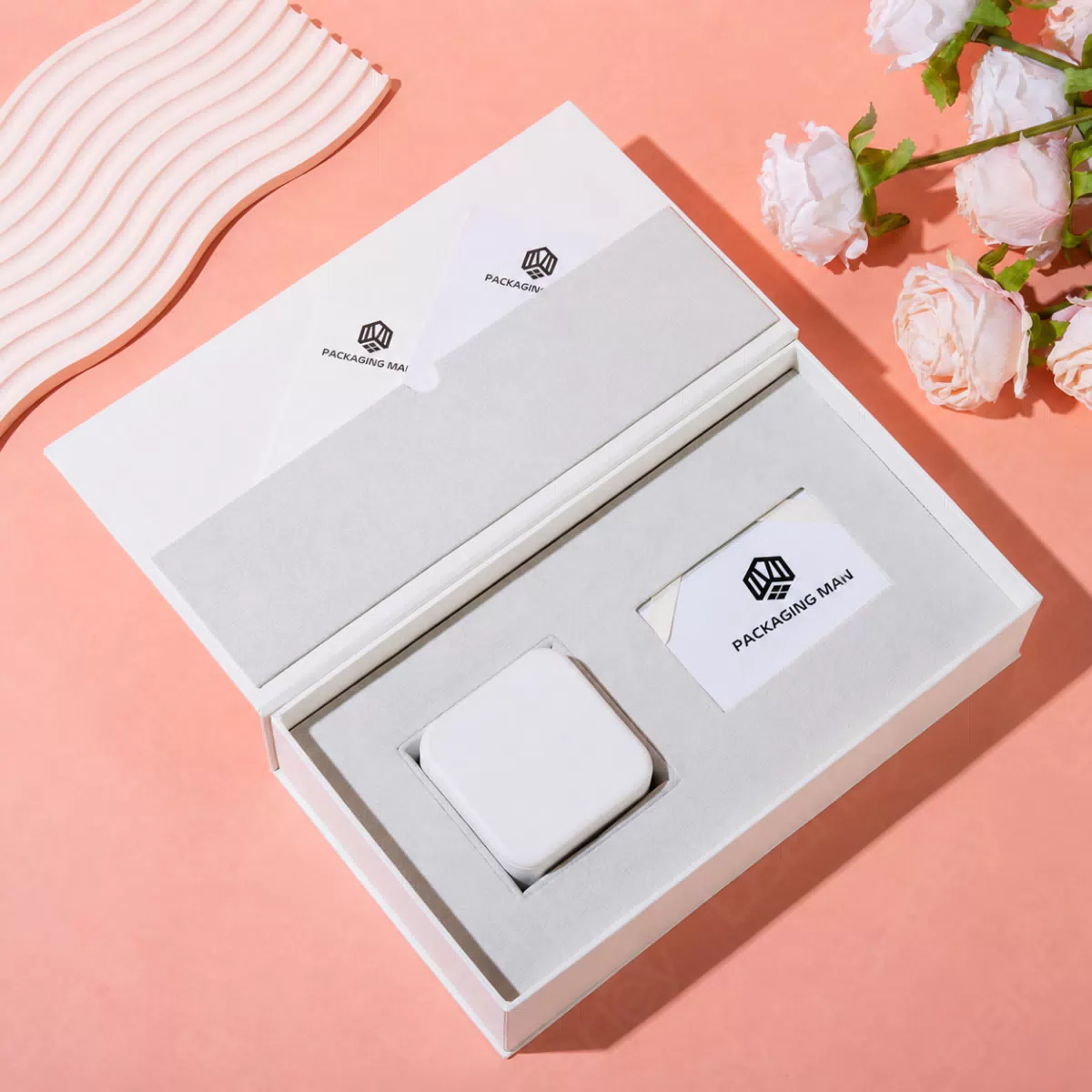 Open white gift box with custom tray