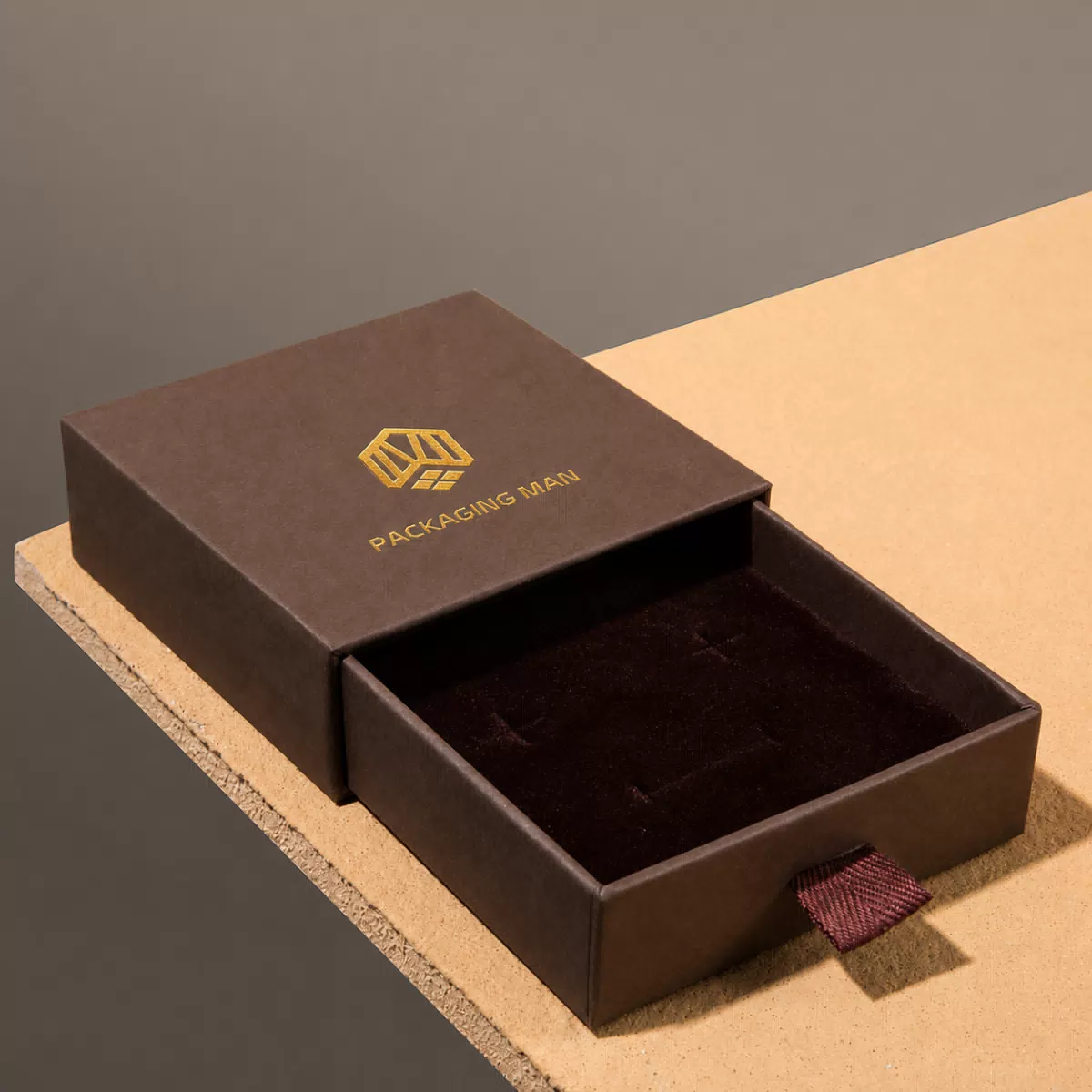 Empty dark brown drawer box with ribbon