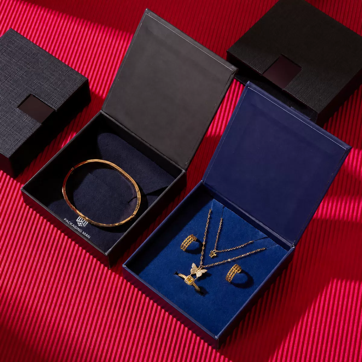Open black and blue jewelry gift boxes