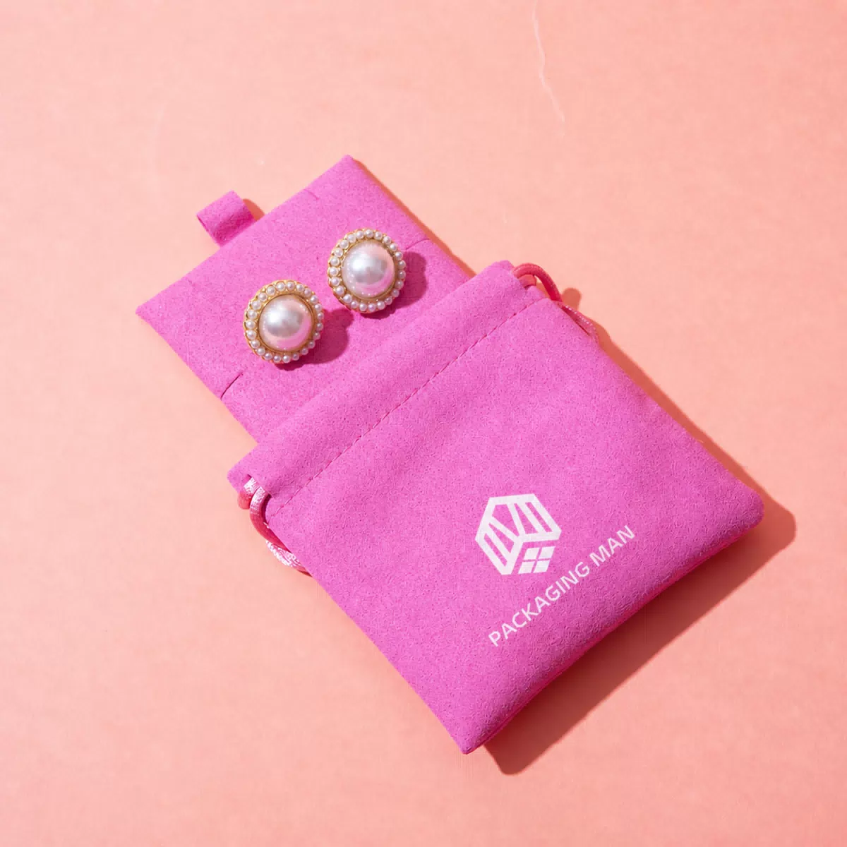 Pink velvet pouch and earring card