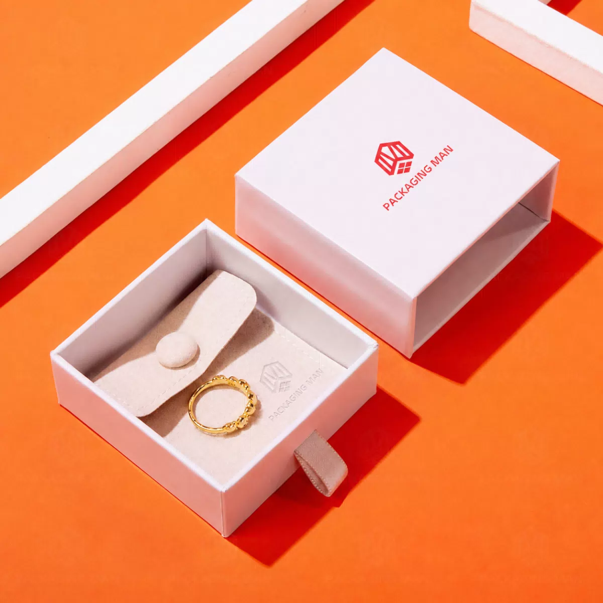 White drawer box with gold ring insert