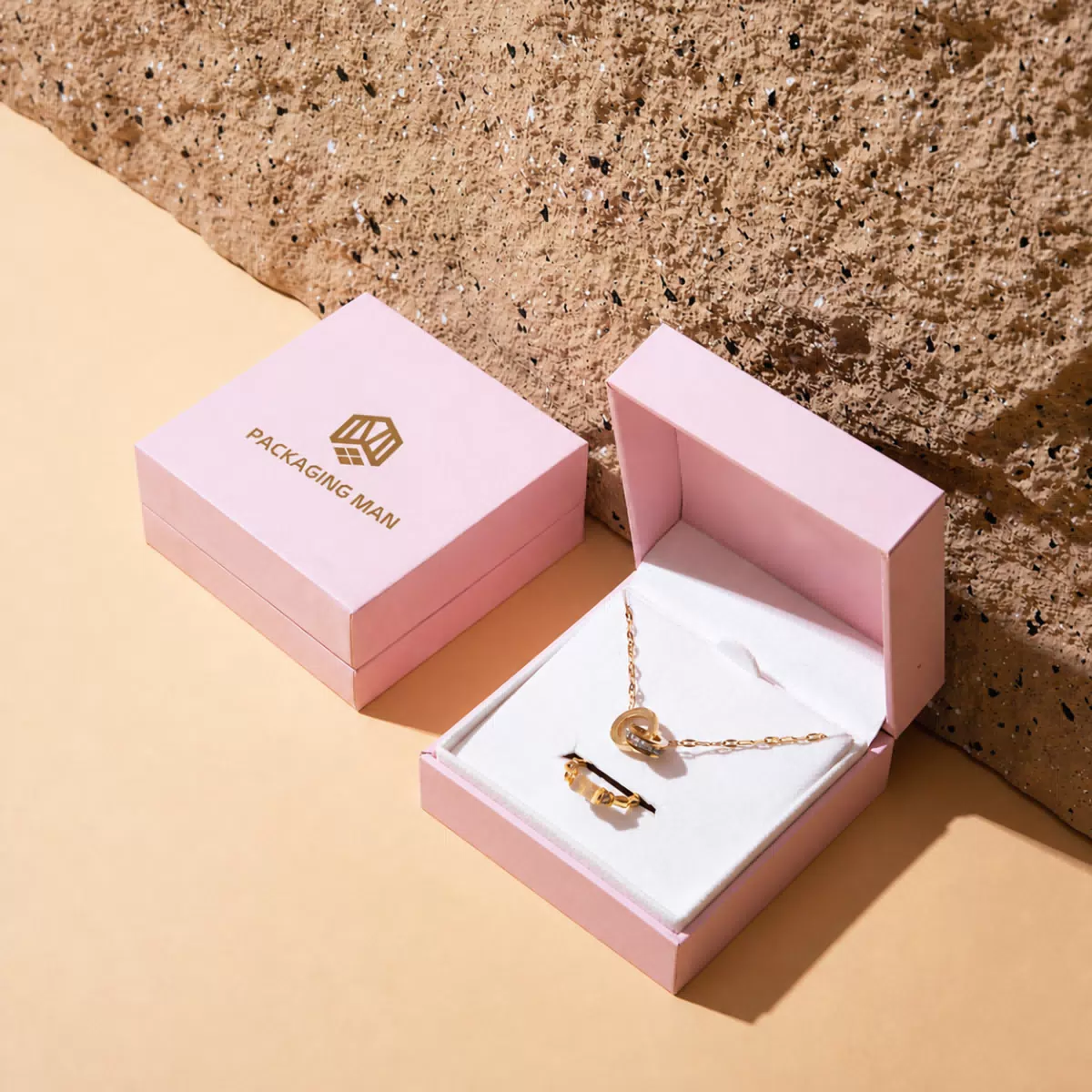 Open pink gift box with white insert