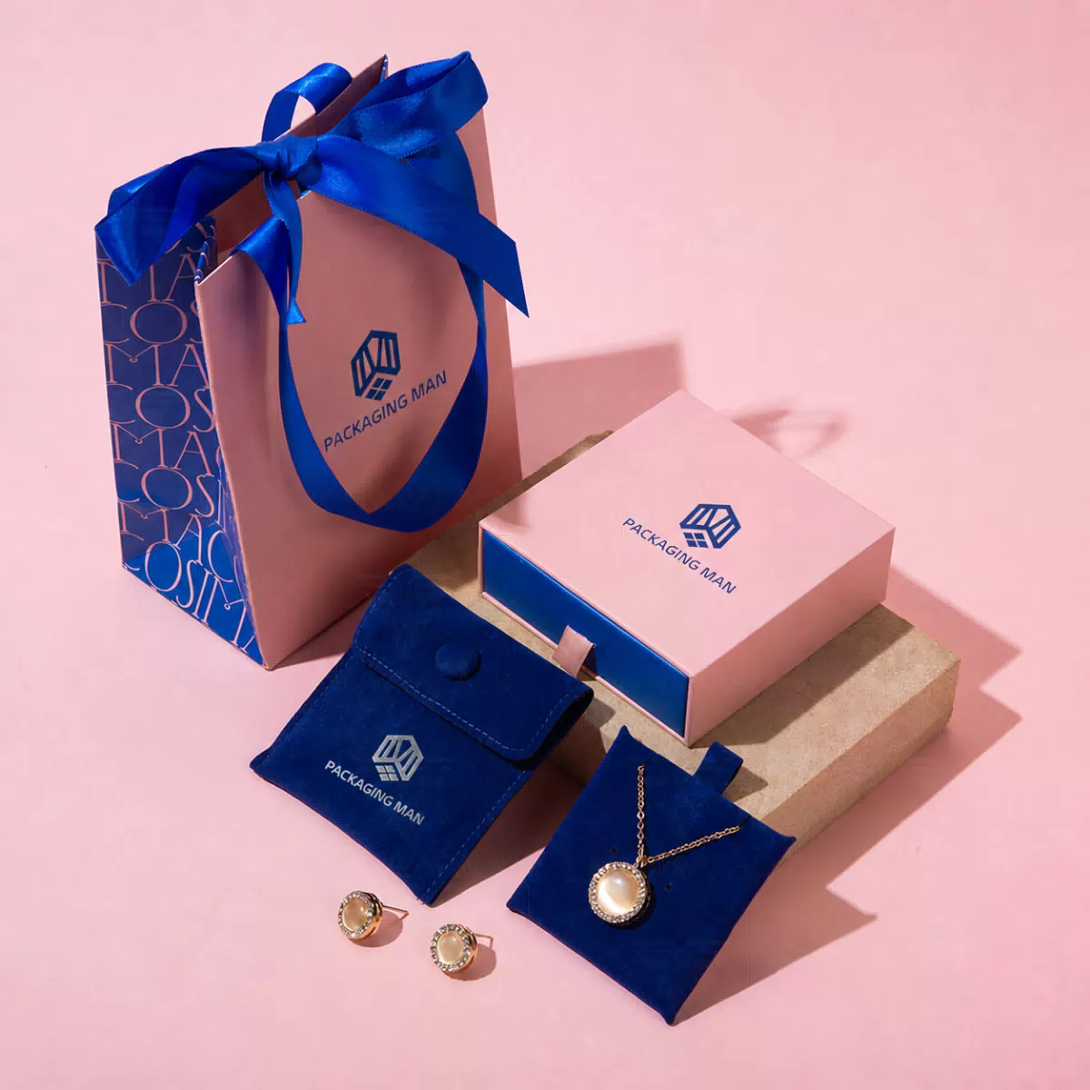 Pink drawer box with blue velvet pouch