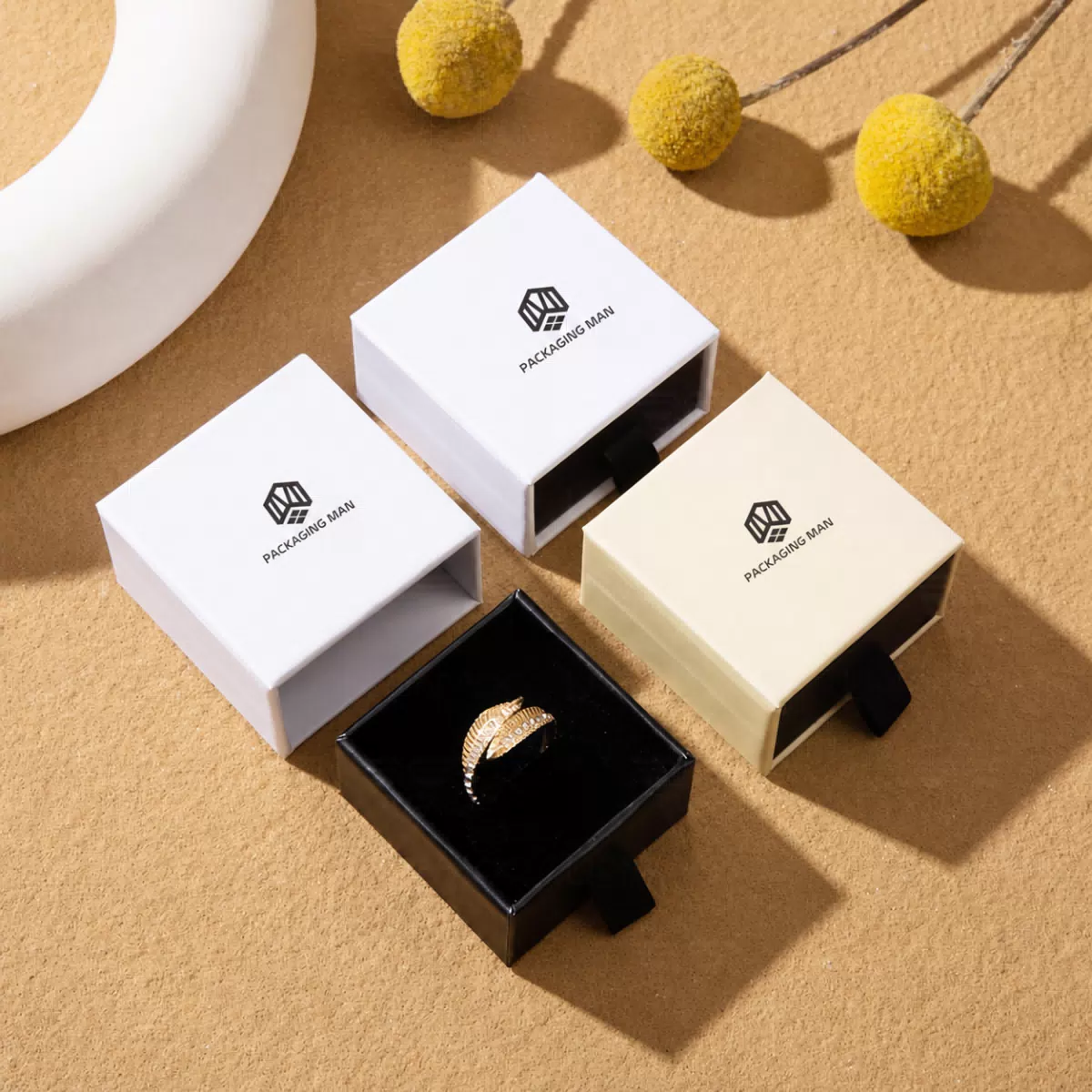 Cream and white sliding gift boxes