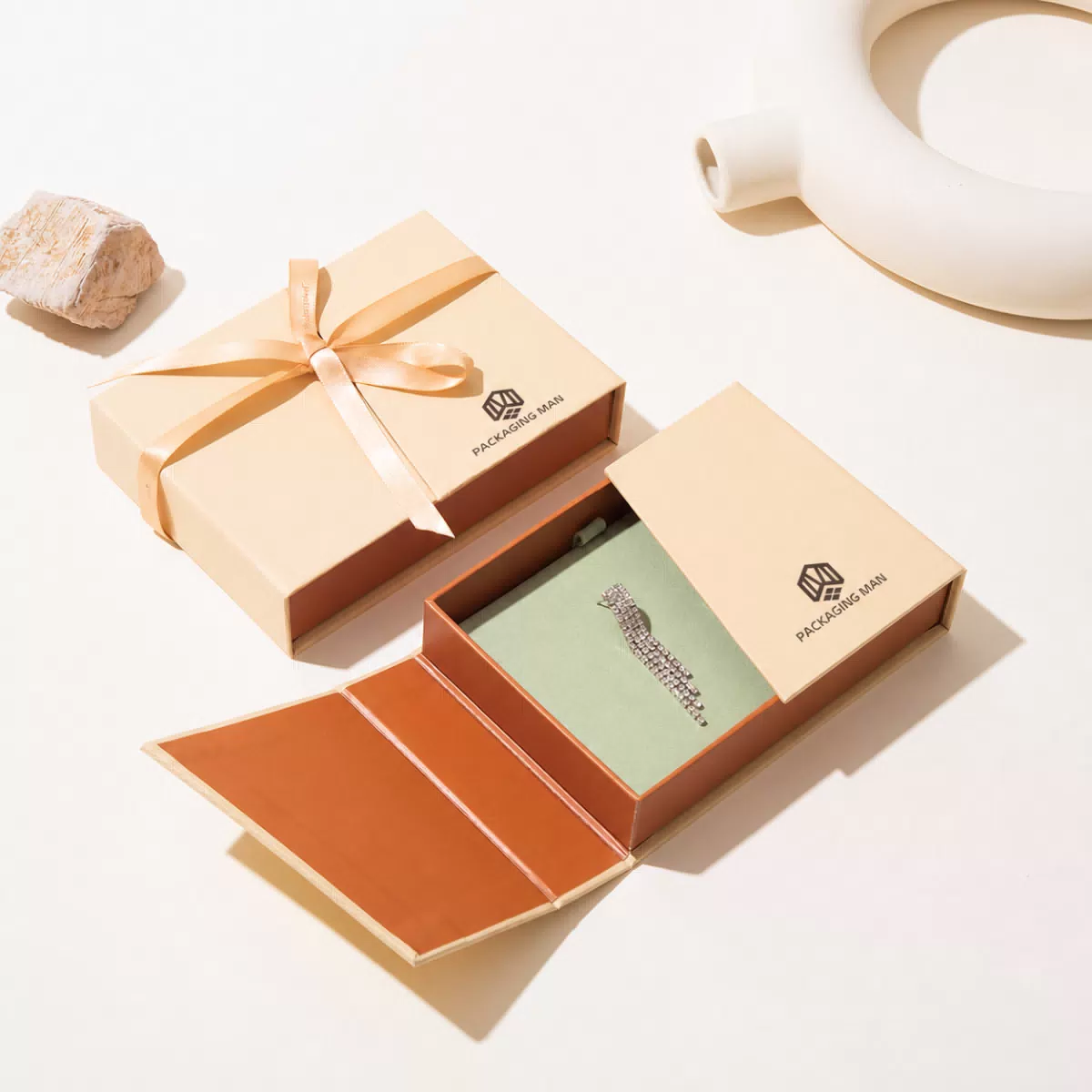 Beige packaging box with green tray