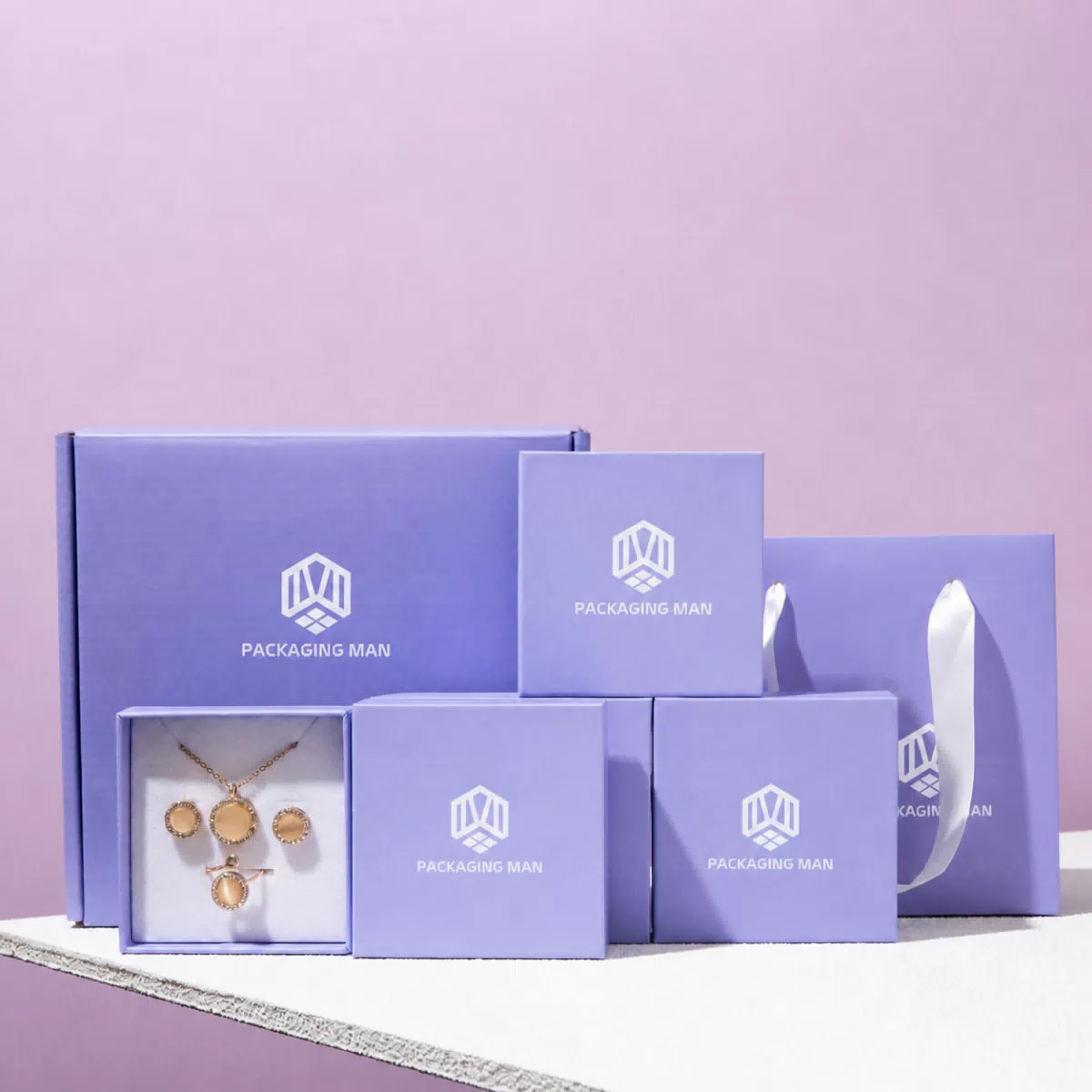 Purple rigid gift boxes with white ribbon handles