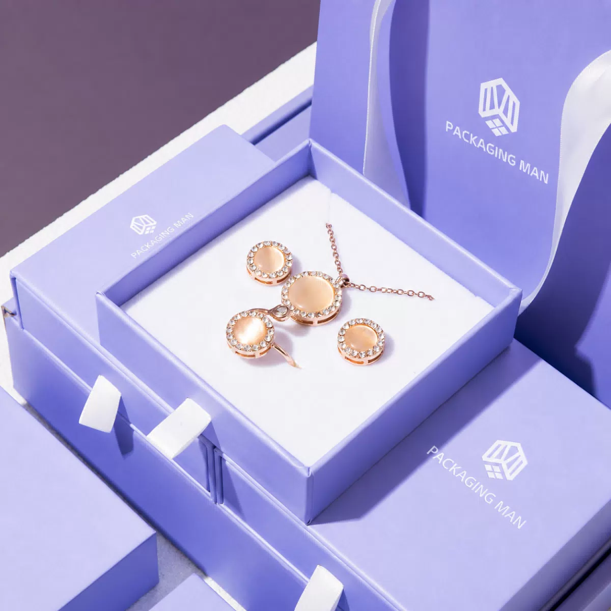 Open purple drawer box with jewelry insert