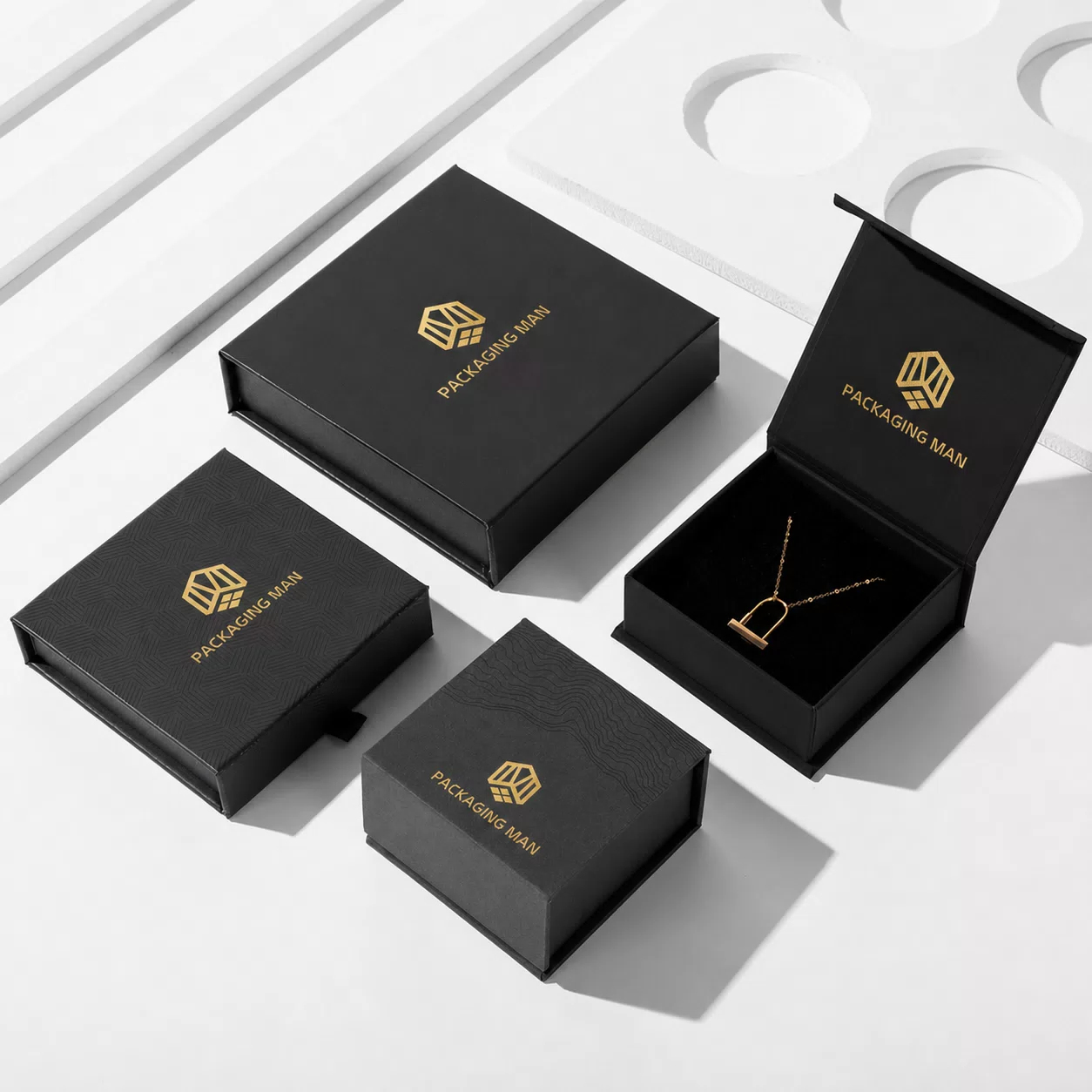 Black rigid box with necklace inside