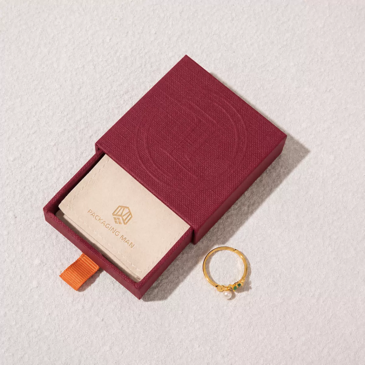 Open burgundy drawer box packaging