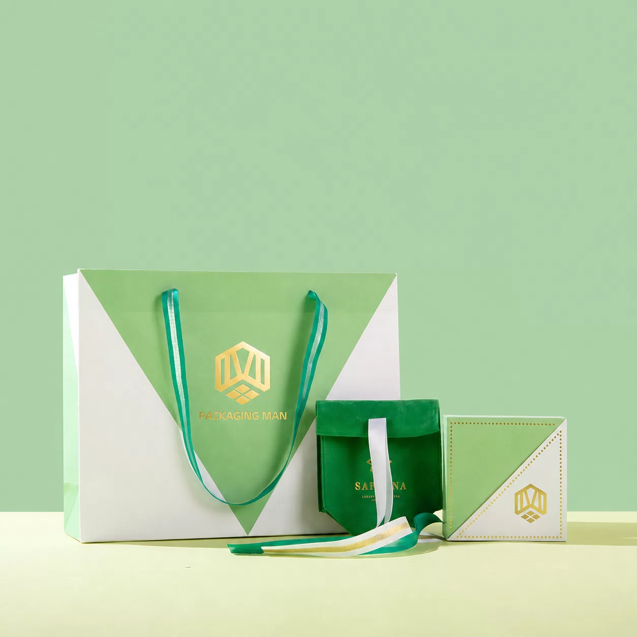 Green and white custom paper gift packaging group shot