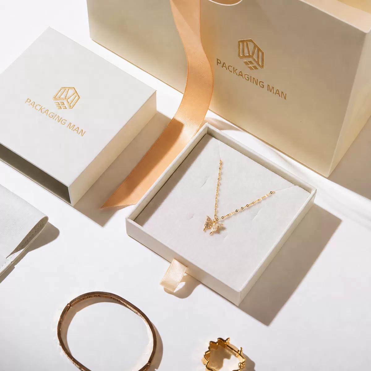 Open beige gift box with necklace insert