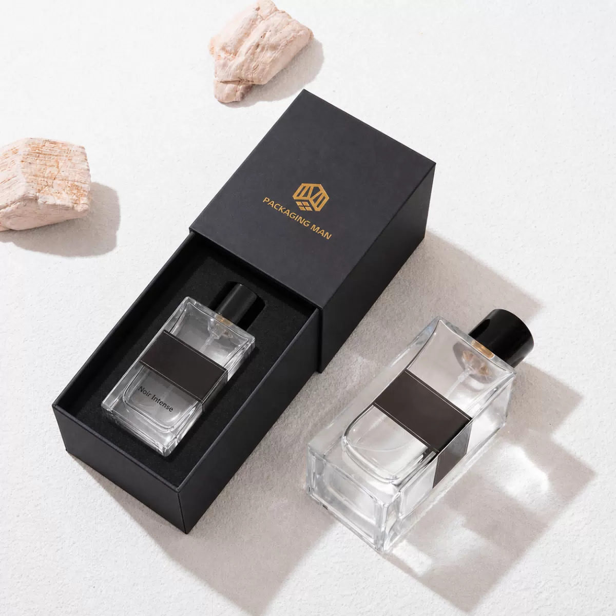 Black gift box with bottle inside