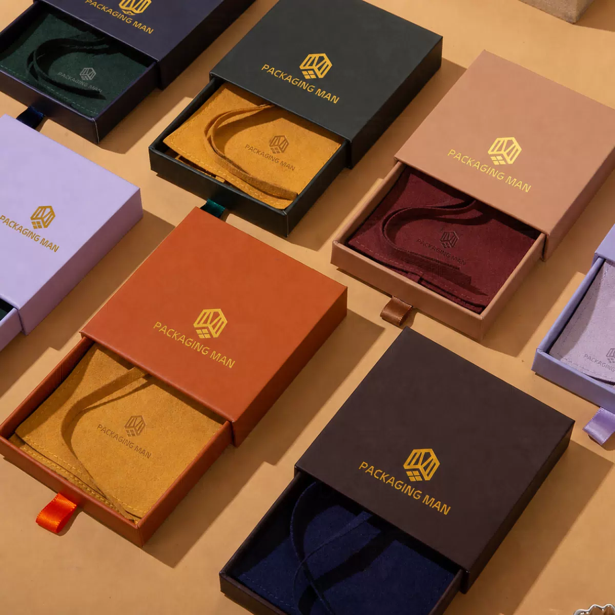 Assorted colored drawer gift boxes open
