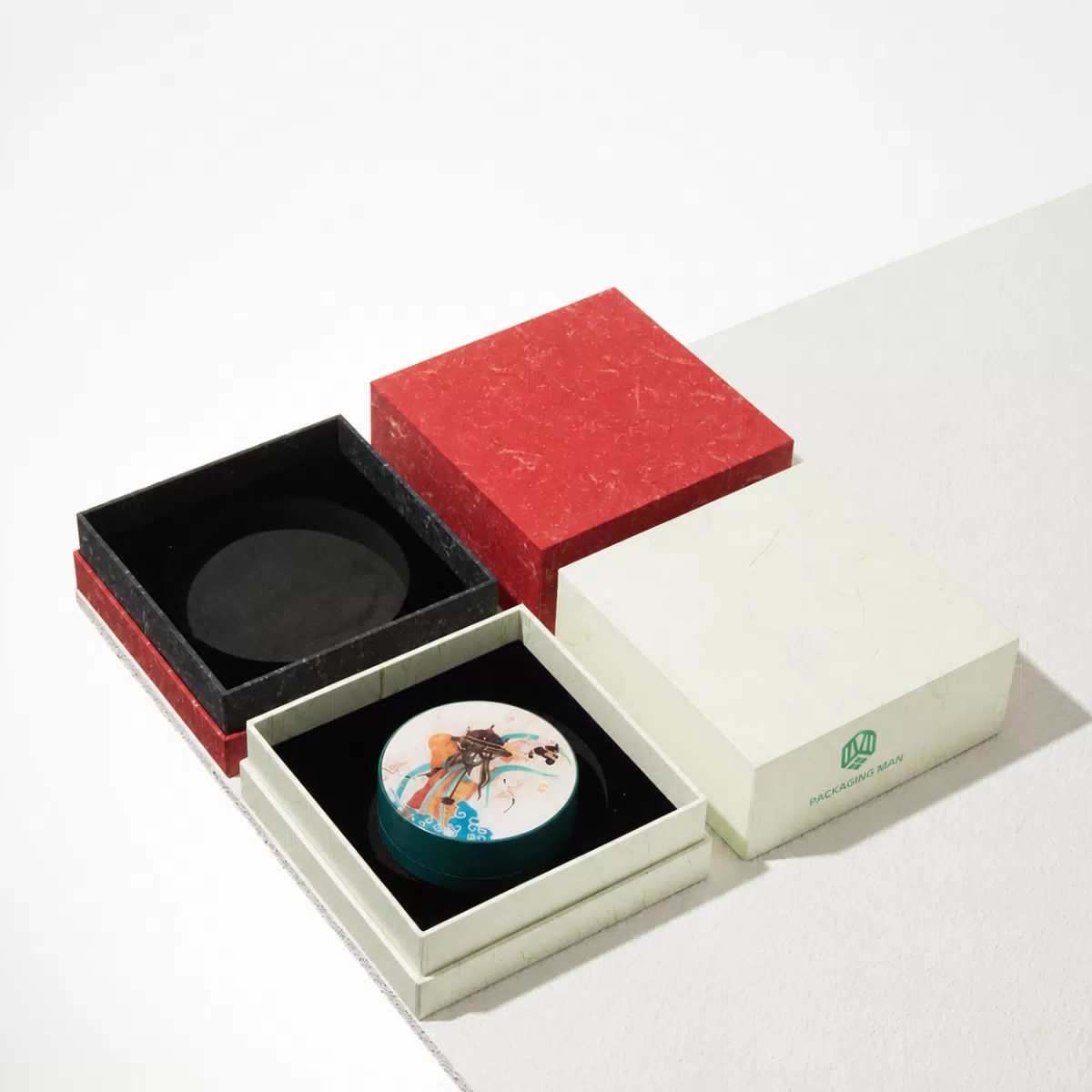 Red and white rigid gift boxes with black insert