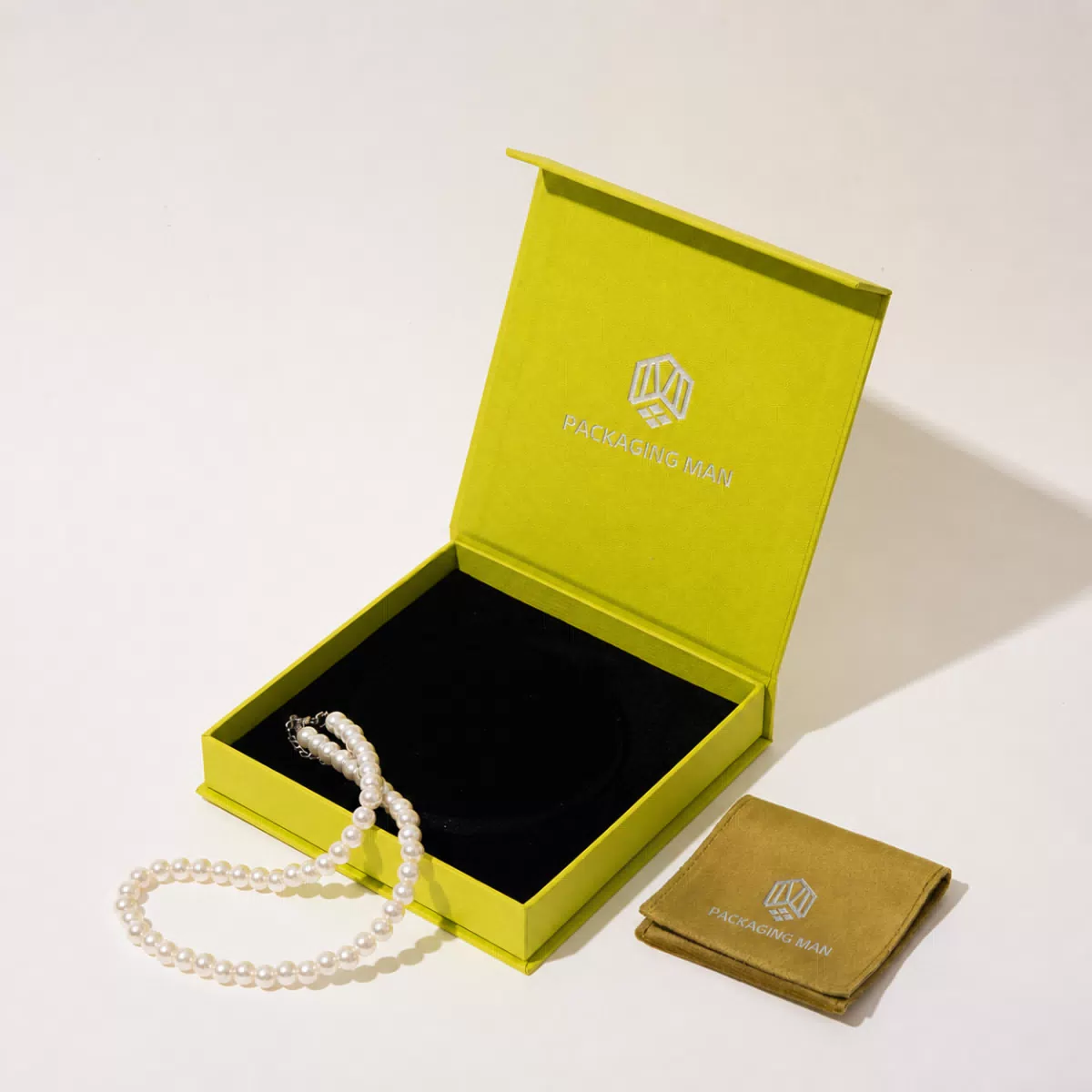 Yellow-green hinged gift box packaging