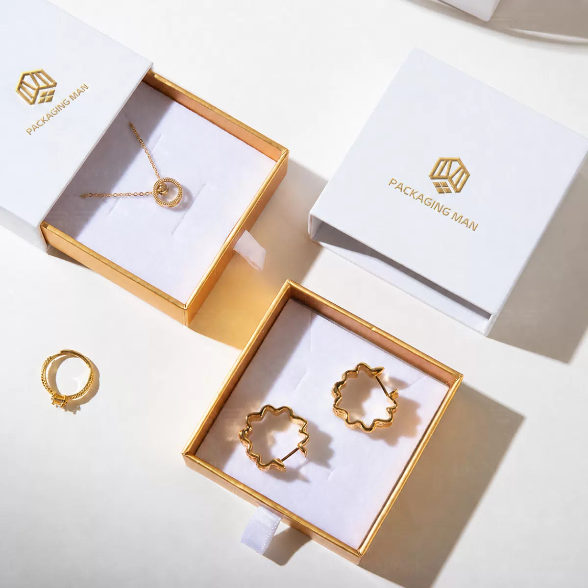 Open white sliding box packaging detail