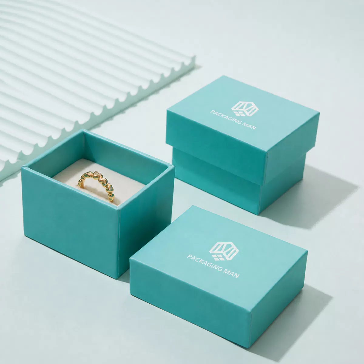 Turquoise gift boxes with white inner tray