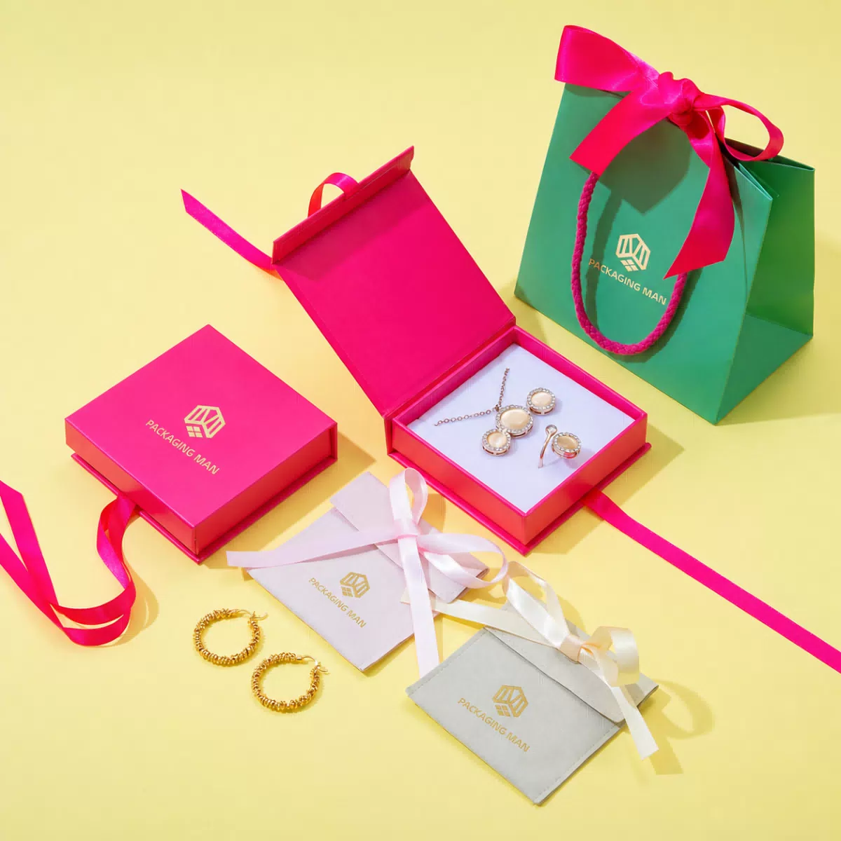 Pink rigid box packaging with accessories