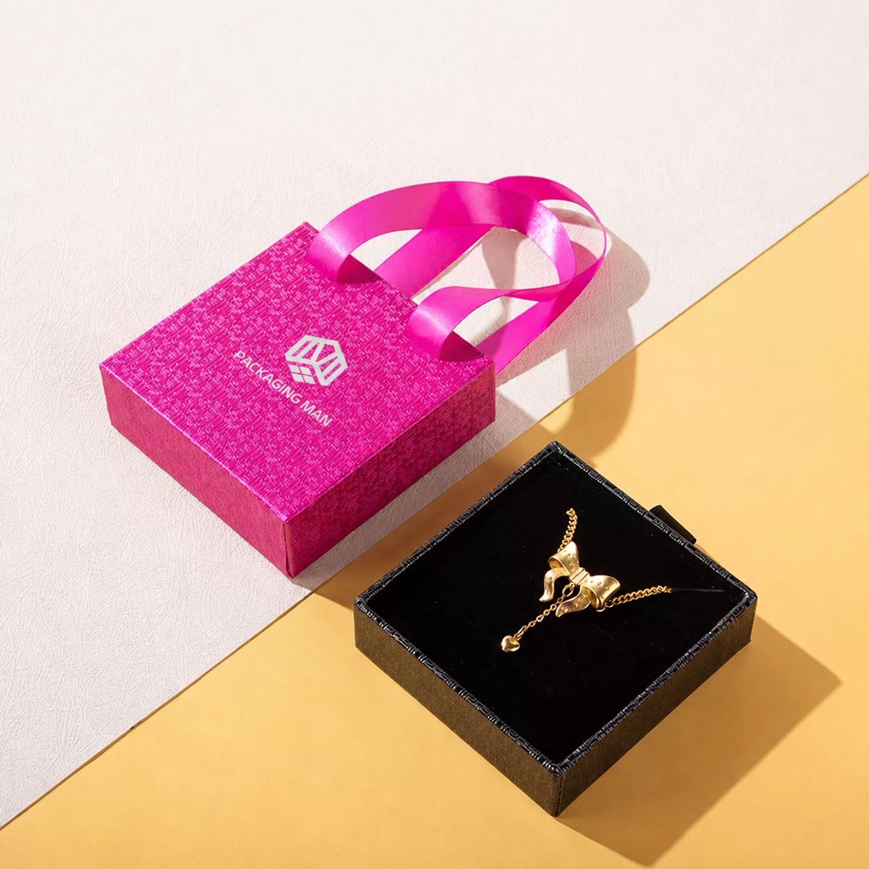 Pink textured box and black jewelry box