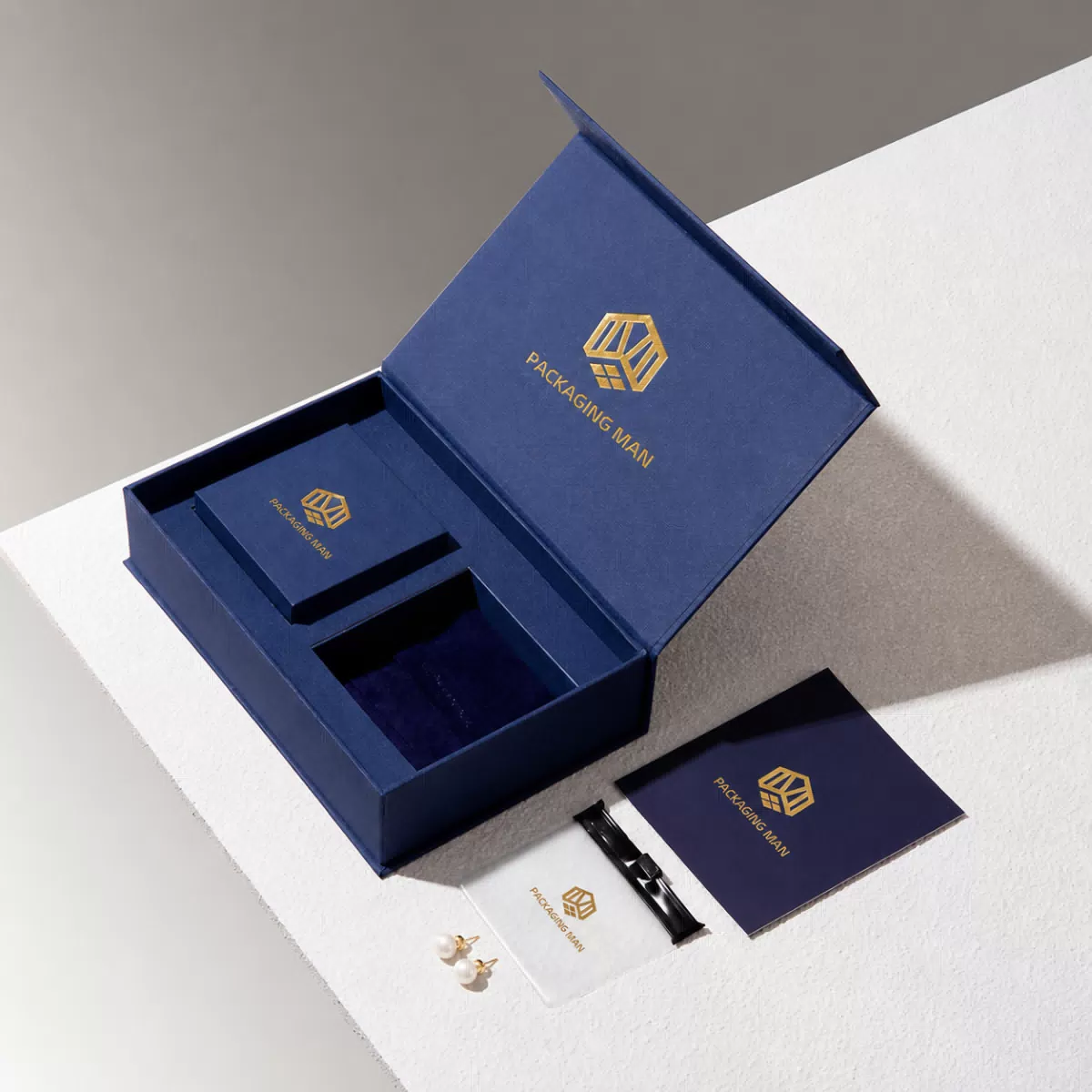 Blue gift box set with open lid and accessories