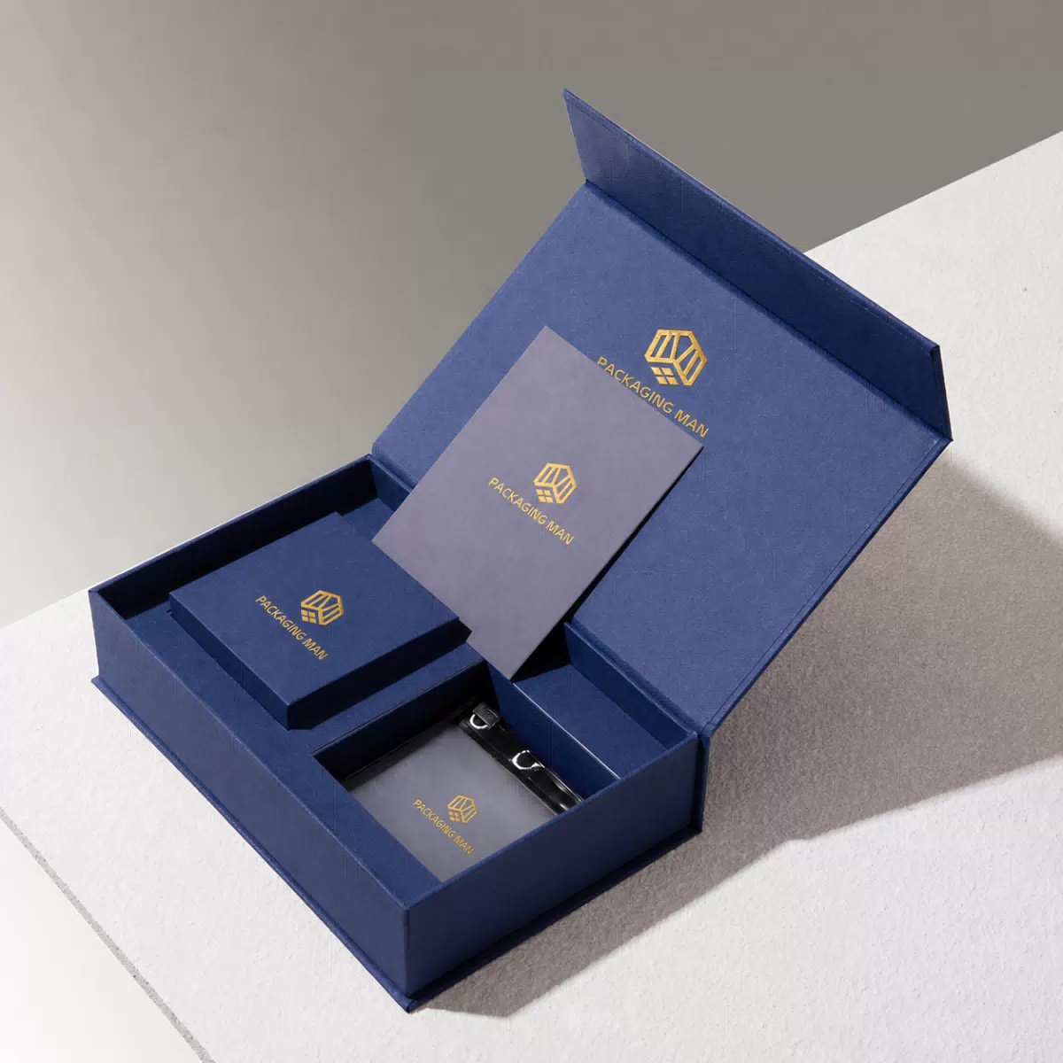 Dark blue hinged gift box with internal insert